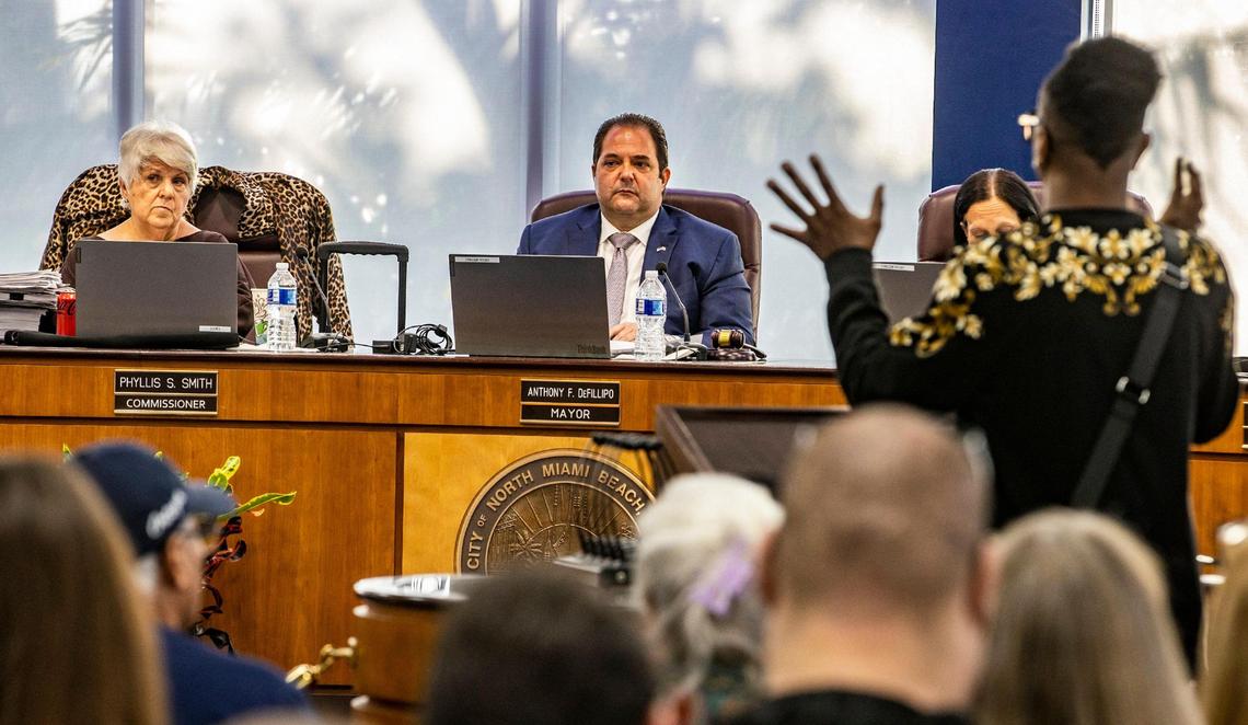 City of North Miami Beach Mayor Anthony F. DeFillipo flanked by Commissioners Phyllis Smith (far left) and Fortuna Smukler listen as a resident speaks at the City chambers as they discussed the hiring of a new city attorney during the first meeting where all commissioners attended after a judge ordered them to do so, on Tuesday March 21, 2023.