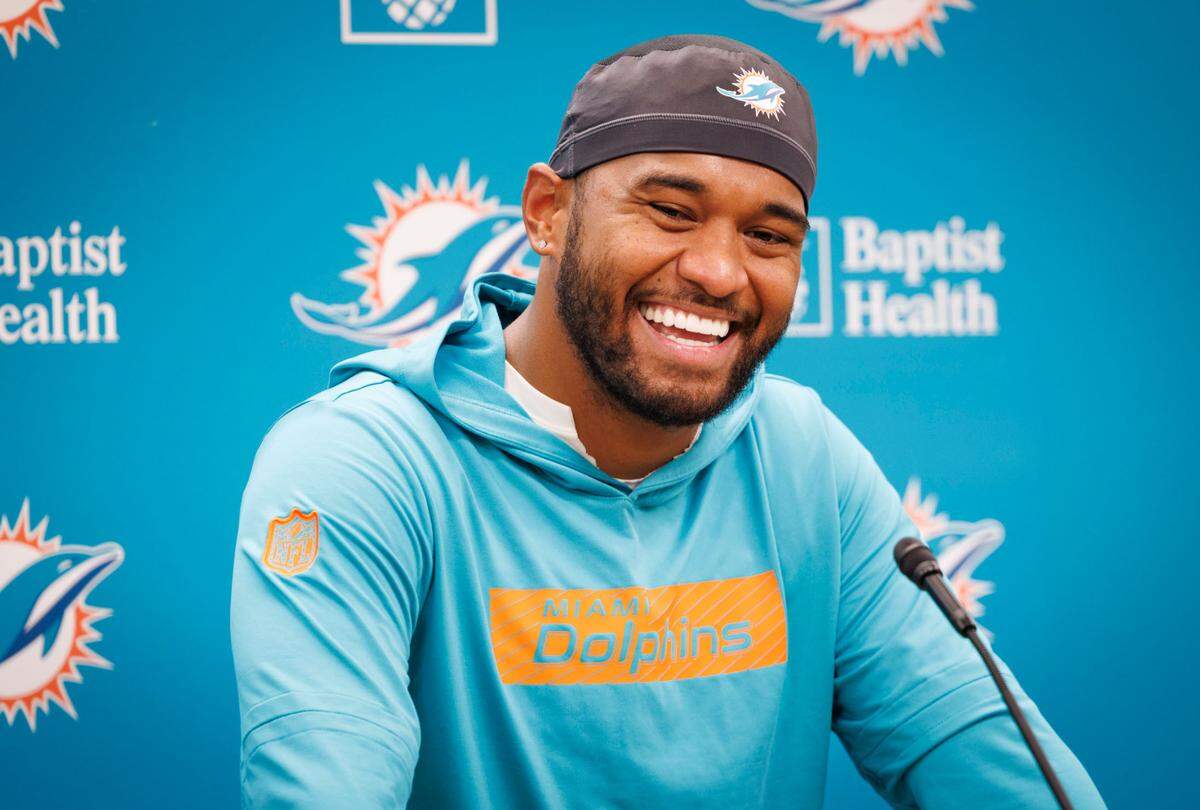 Miami Dolphins quarterback Tua Tagovailoa (1) speaks after practice on Monday, Aug. 26, 2024, at Baptist Health Training Complex at the Hard Rock Stadium in Miami Gardens, Fla.