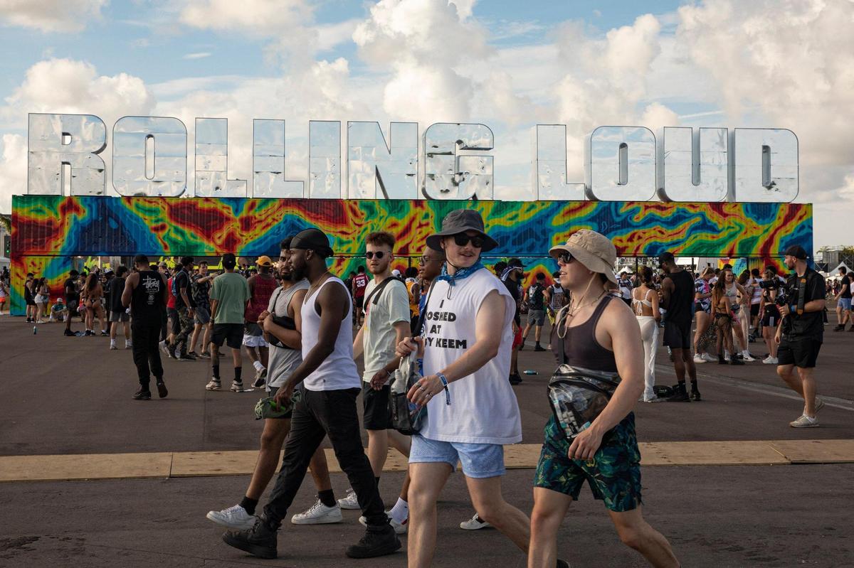 People are seen at Rolling Loud at Hard Rock Stadium in Miami Gardens, Florida on Sunday, July 24, 2022.
