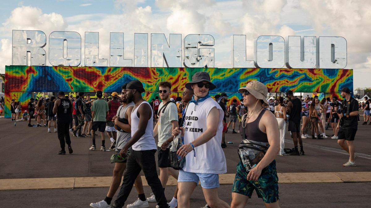 People are seen at Rolling Loud at Hard Rock Stadium in Miami Gardens, Florida on Sunday, July 24, 2022.
