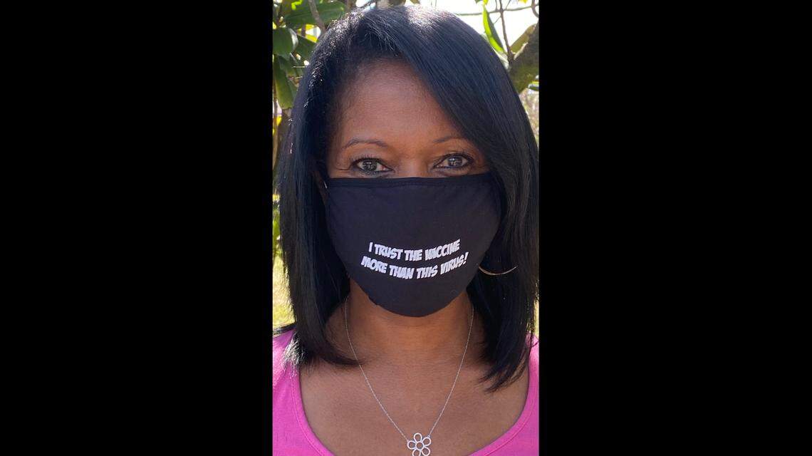 Dr. Tina Carroll-Scott will be giving out masks that have the words “I trust the vaccine more than this virus!” at her Pfizer pop-up.