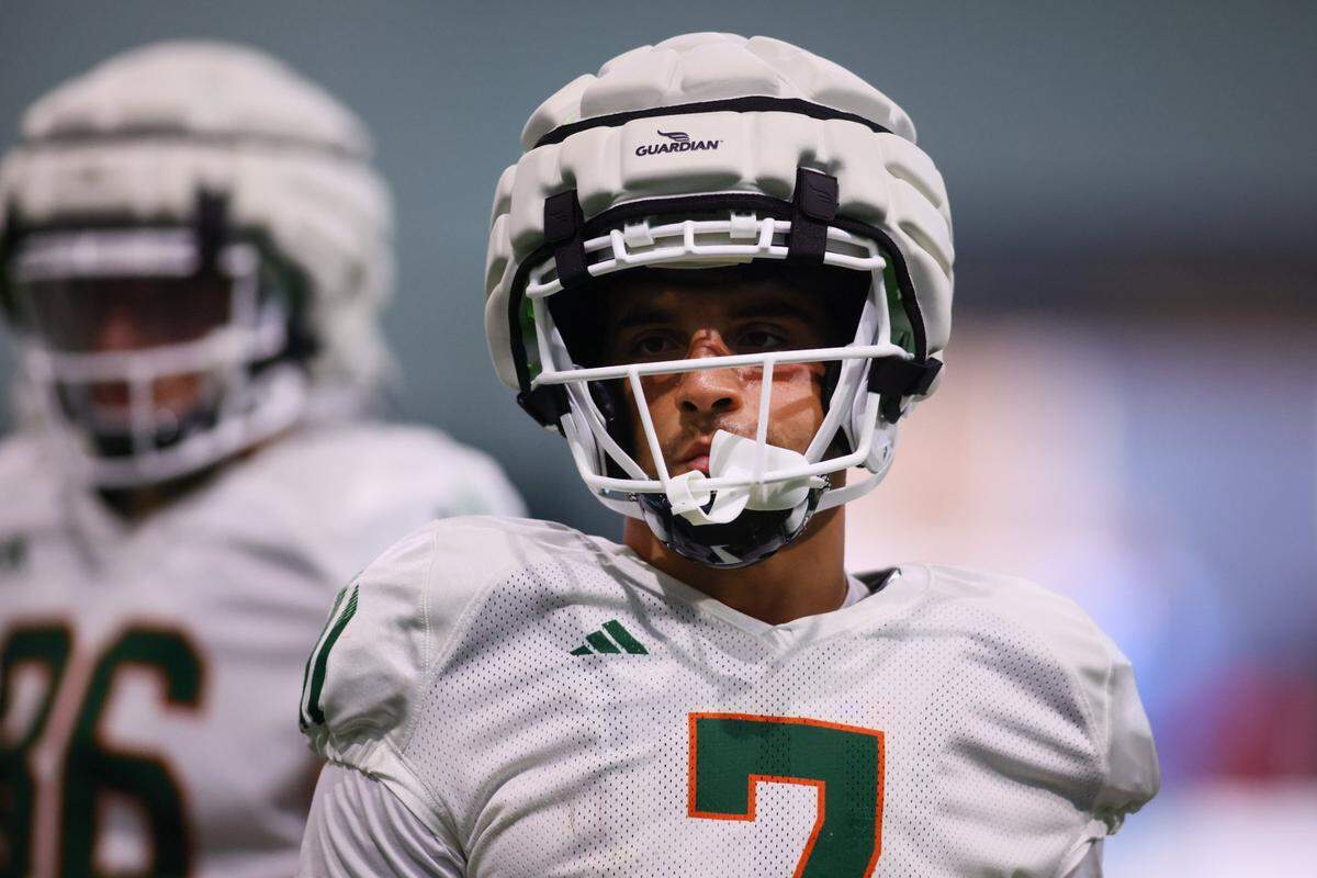 Miami Hurricanes wide receiver Xavier Restrepo (7) looks on during training camp at the Carol Soffer Indoor Practice Facility at the University of Miami in Coral Gables, Florida, Saturday, August 3, 2024.