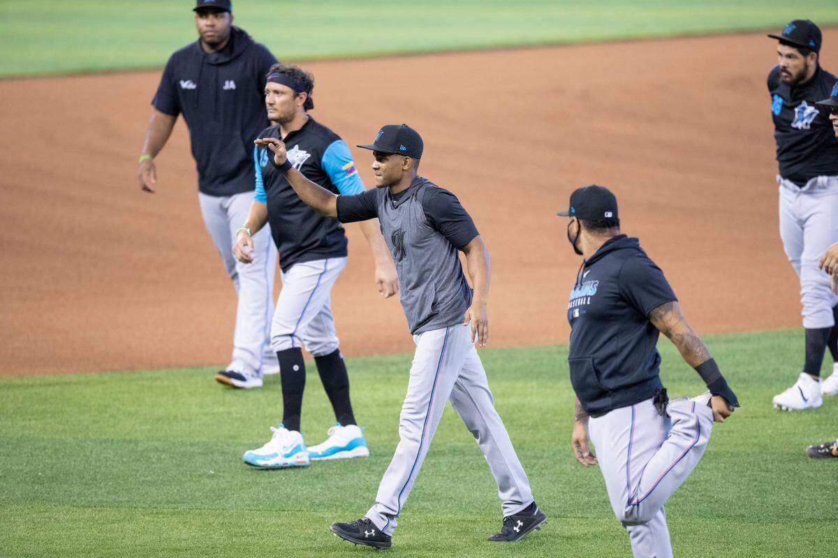 Miami Marlins outfielder Magneuris Sierra warms up during Marlins training camp at Marlins Park on Wednesday, July 8, 2020.
