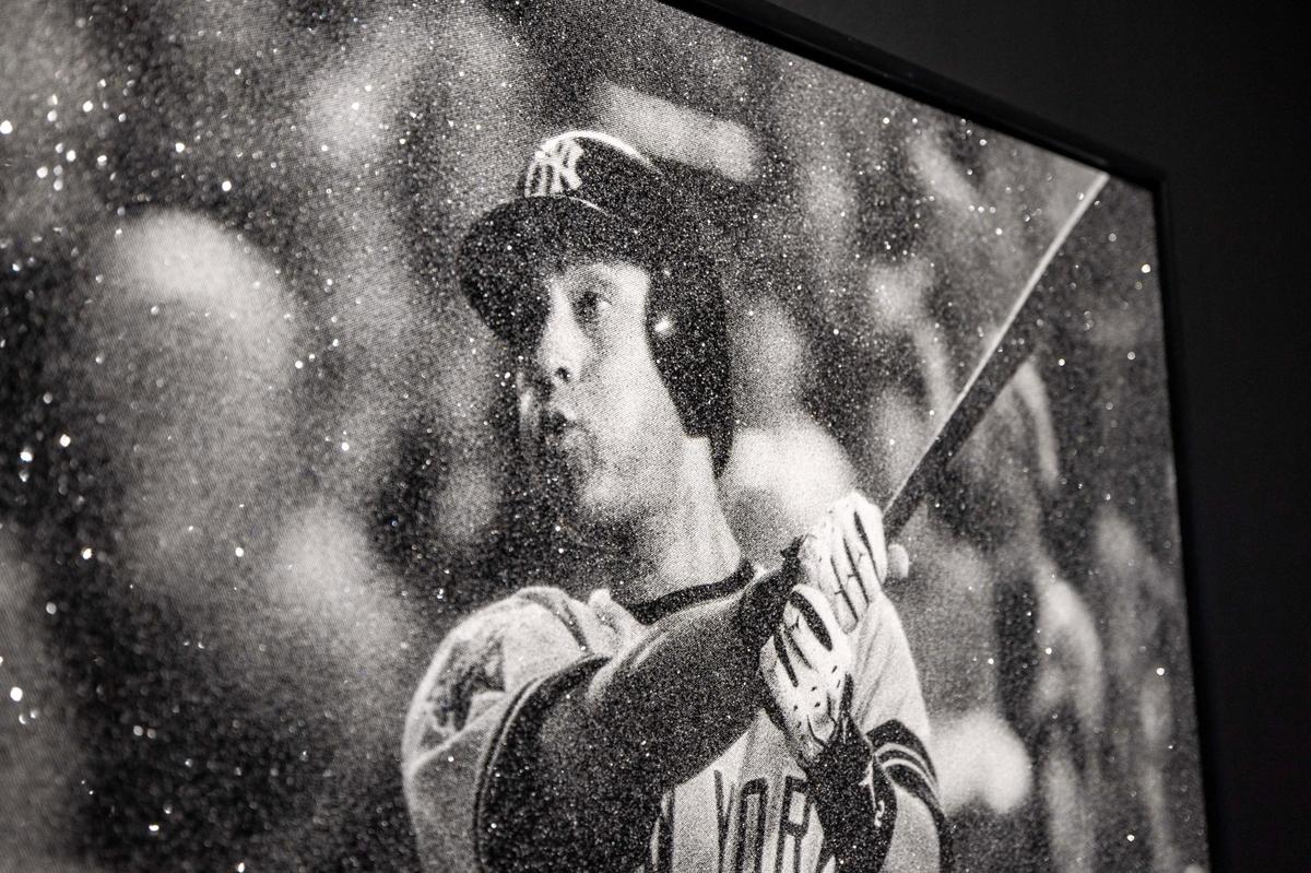 ‘The Swing’ by Russell Young on display during Art Miami at One Herald Plaza on Tuesday, Dec. 3, 2024, in Miami, Fla. Young was commissioned by the MLB to create an artwork featuring Derek Jeter.