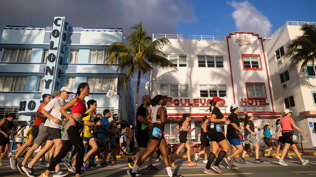 Runners make their way down Ocean Drive while participating in the Life Time Miami Marathon and Half Marathon on Sunday, Jan. 29, 2023, in Miami Beach, Fla.