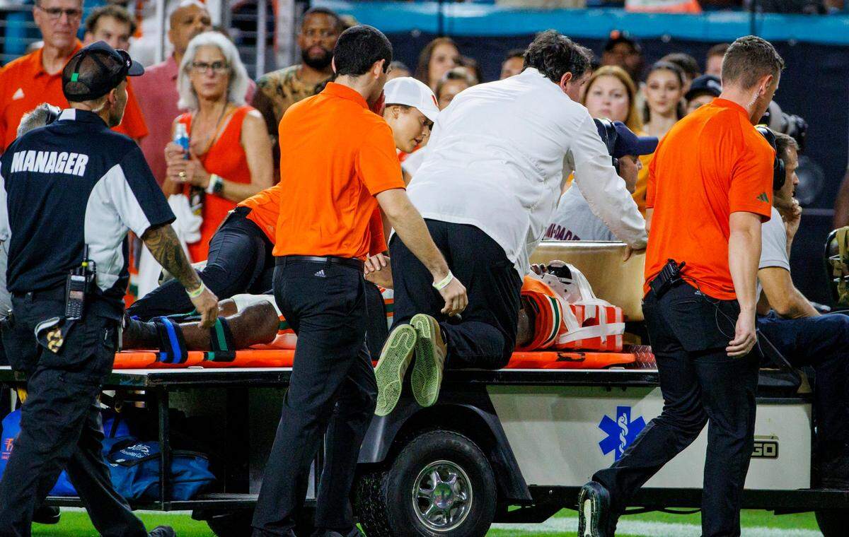 Miami Hurricanes safety Kamren Kinchens is taken off the field on a cart after an injury in a play against Texas A&M during the fourth quarter of an NCAA non conference game at Hard Rock Stadium on Saturday, Sept. 9, 2023 in Miami Gardens, Florida.