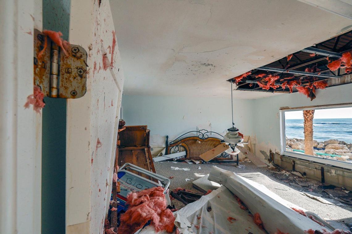 Storm surge and wind from hurricanes Helene and Milton caused beach erosion and damaged condos at the Fisherman’s Cove beachfront condominium in Siesta Key.