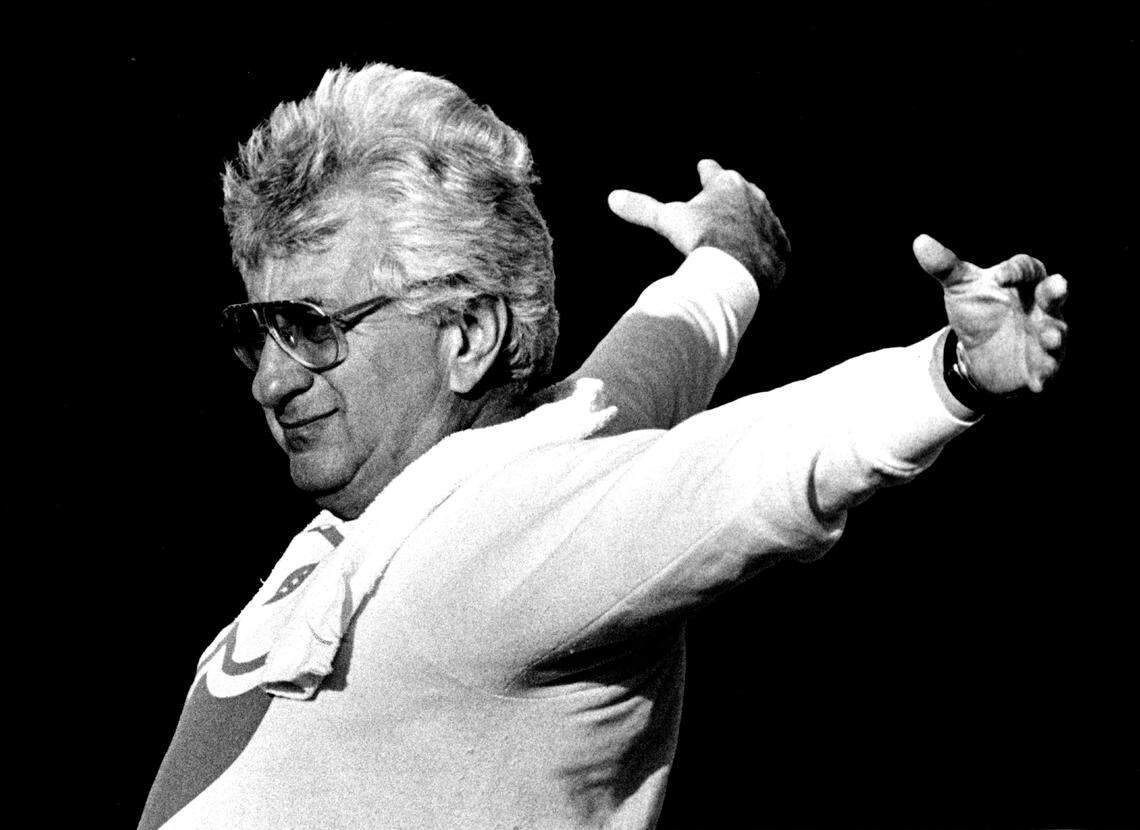 Stephen Muss leads a group through their exercises before going on a health walk.