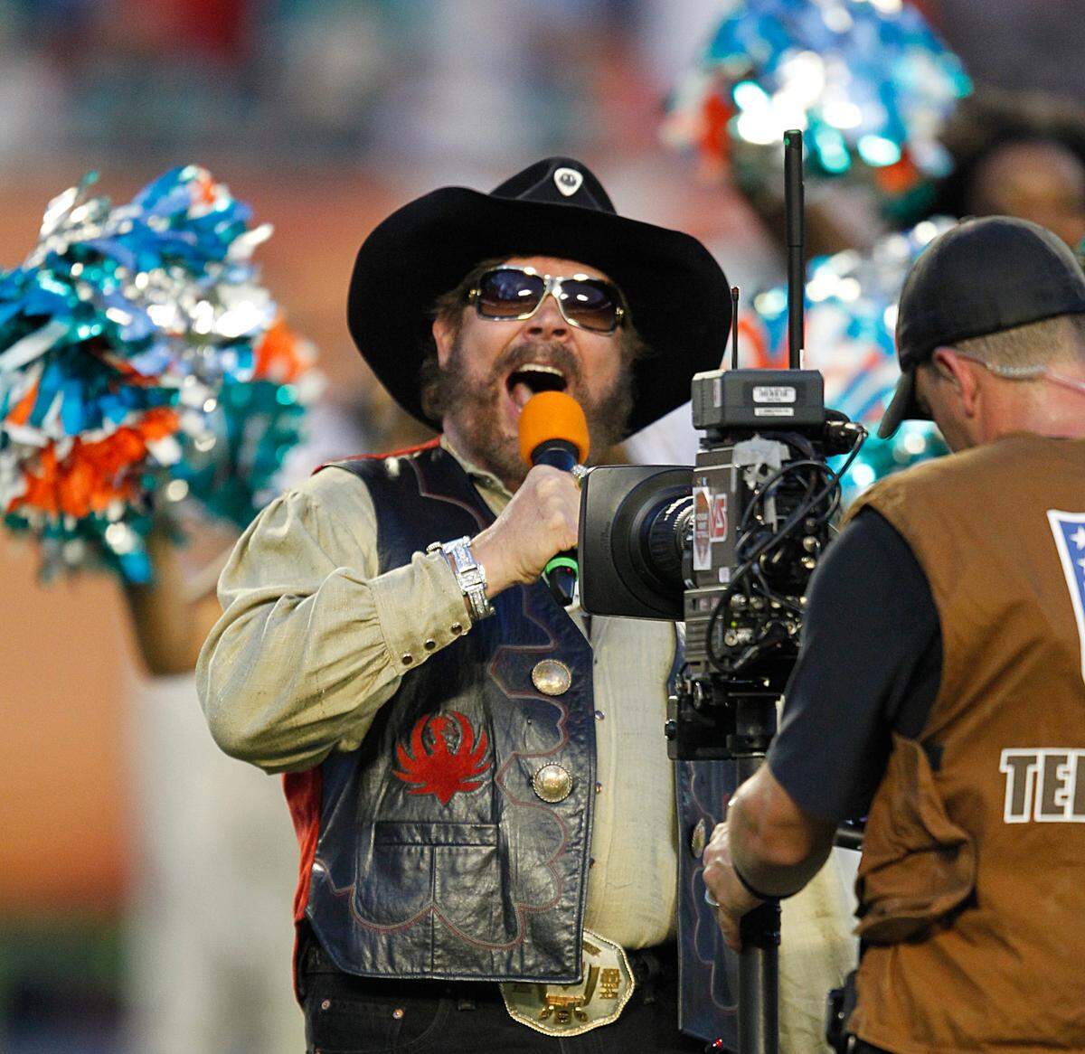 To start “Monday Night Football,” Hank Williams Jr. yells, “are you ready for some football,” as the Miami Dolphins play the New England Patriots at Sun Life Stadium in Miami Gardens in this Sept. 12, 2011 file photo.