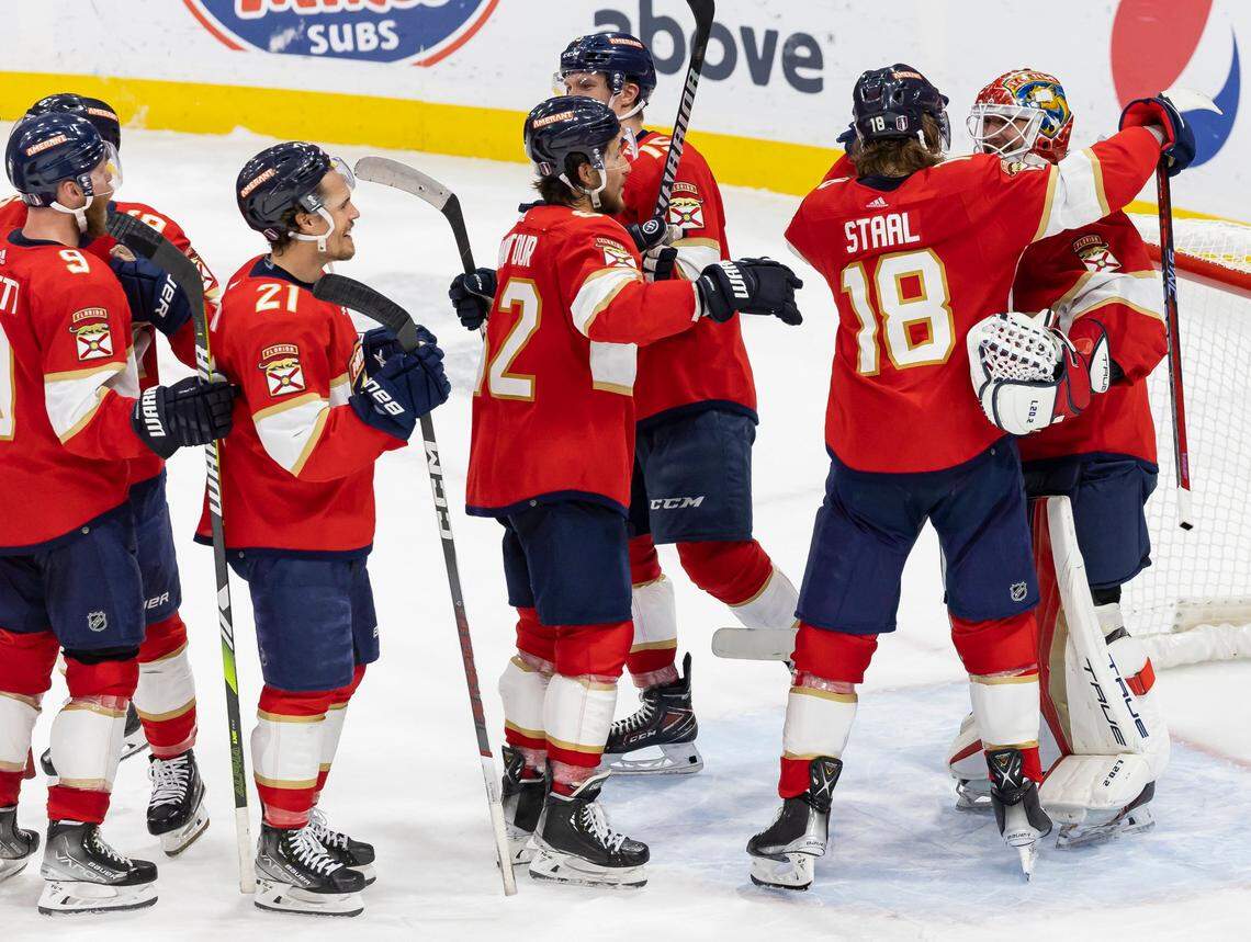 Teammates lineup to celebrate with Florida Panthers goaltender Sergei Bobrovsky (72) after they defeated the Carolina Hurricanes in Game 4 of the NHL Stanley Cup Eastern Conference finals series at the FLA Live Arena on Wednesday, May 24, 2023 in Sunrise, Fla.