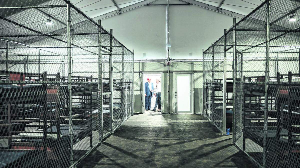 President Donald Trump participates in a walking tour of the immigration detention center nicknamed "Alligator Alcatraz" on Tuesday, July 1, 2025, in Ochopee, Florida.