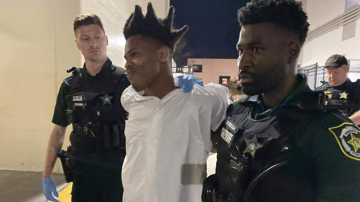 Nineteen-year-old Keith Melvin Moses, the suspect in a series of shootings that left three dead on Wednesday, Feb. 22, 2023, in custody in Orlando.