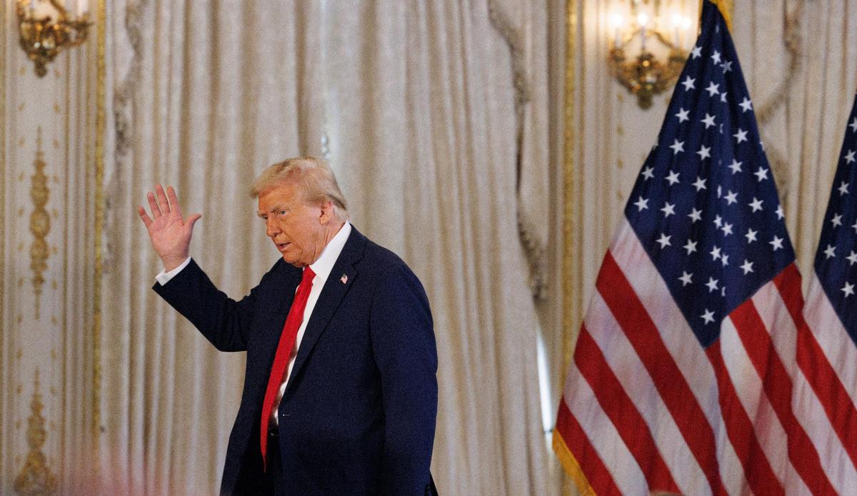 Republican presidential nominee former President Donald Trump waves as he exits after a news conference on Tuesday, Oct. 29, 2024, at his Mar-a-Lago estate in Palm Beach, Fla.