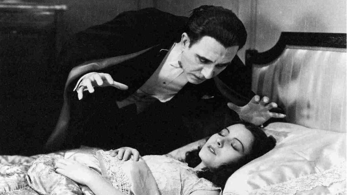 Carlos Villarías as Dracula, with actress Lupita Tovar, in the Spanish-language 1931 film Drácula.