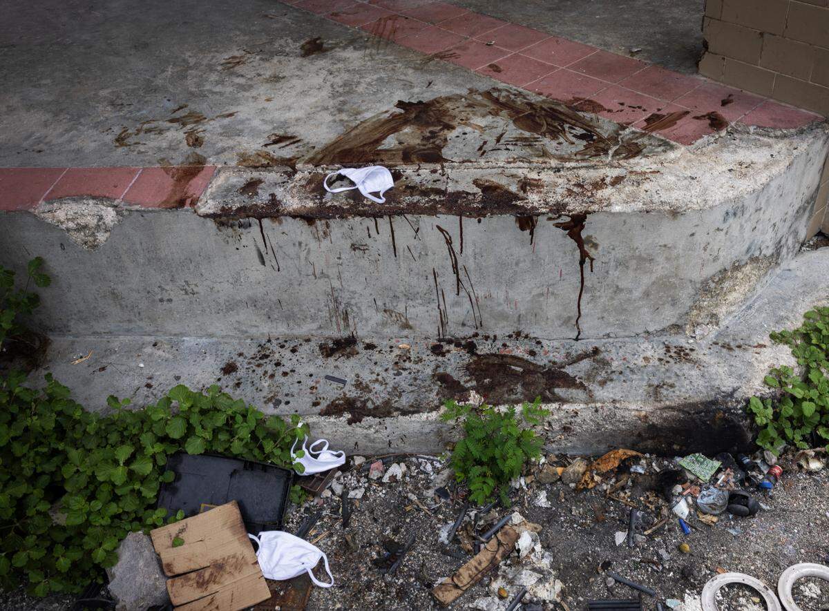 The blood of a gang member who was shot by police is seen in Port-au-Prince on June 2, 2024.