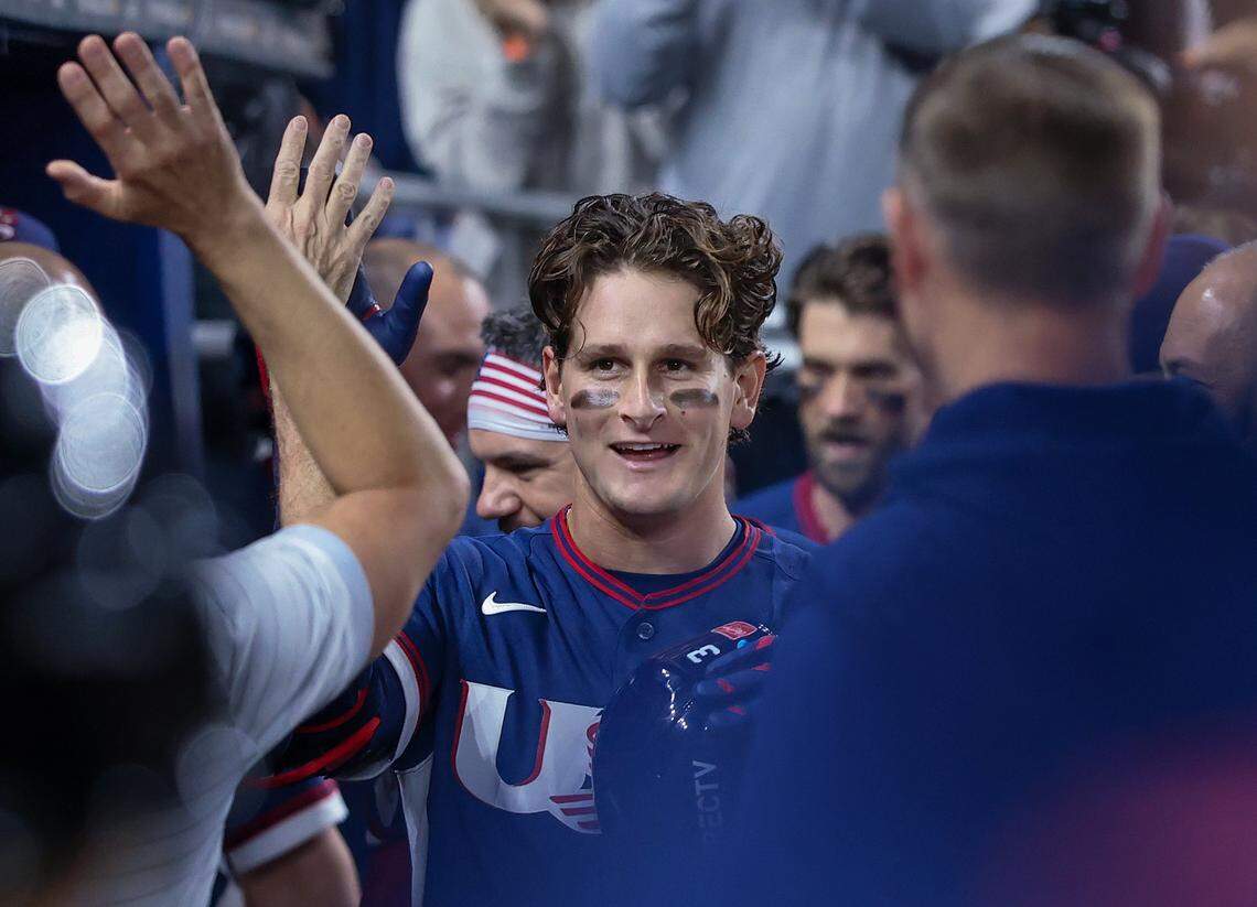 United States right fielder Roman Anthony (3), center, is greeted to the cheers and hi-fives of teammate in the dugout after his home run at semi-finals of the World Baseball Classic United States vs. Dominican Republic at the loanDepot Park on Sunday, March 15, 2026, in Miami, Florida.