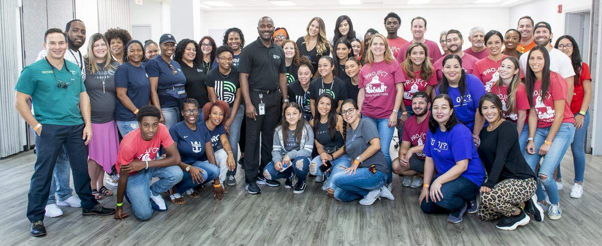 Members of Big Brothers Big Sisters of Miami recently teamed up with Project Ready for School to host a joint Back to School Event at the Carnival Center for Excellence. Gale Nelson, president of Big Brothers Big Sisters, center, with volunteers, sponsors and donors.