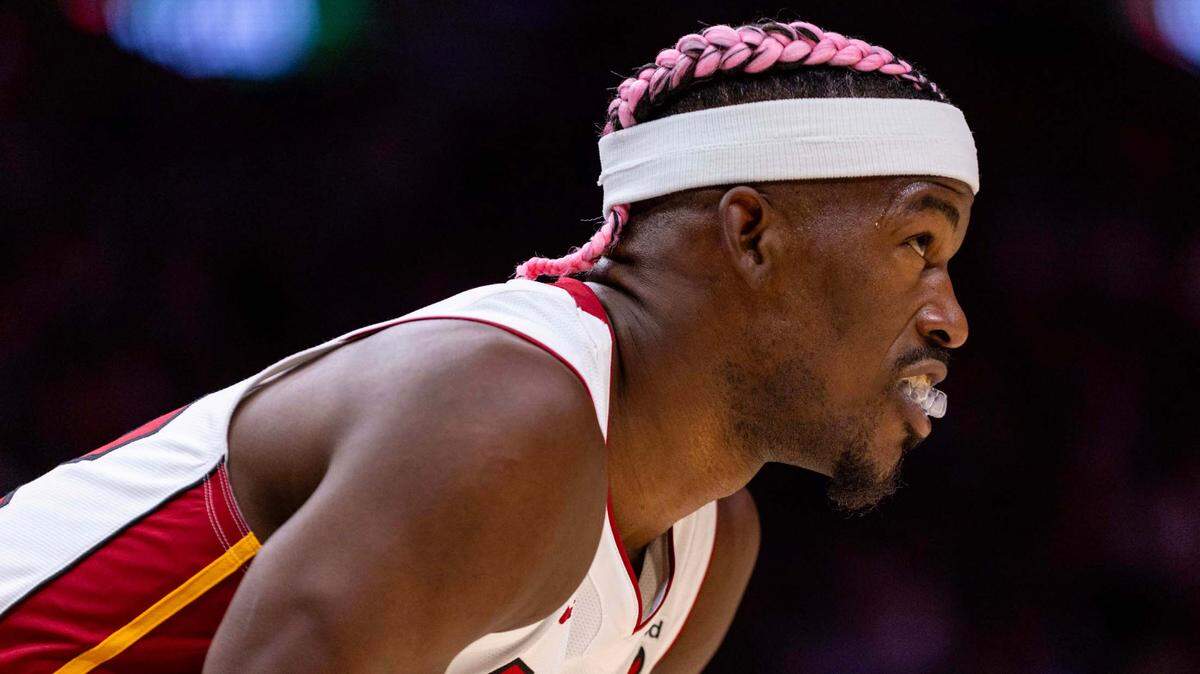 Miami Heat forward Jimmy Butler (22) reacts during the second half of an NBA game at the Kaseya Center on Wednesday, January 1, 2025, in Miami, Fla.