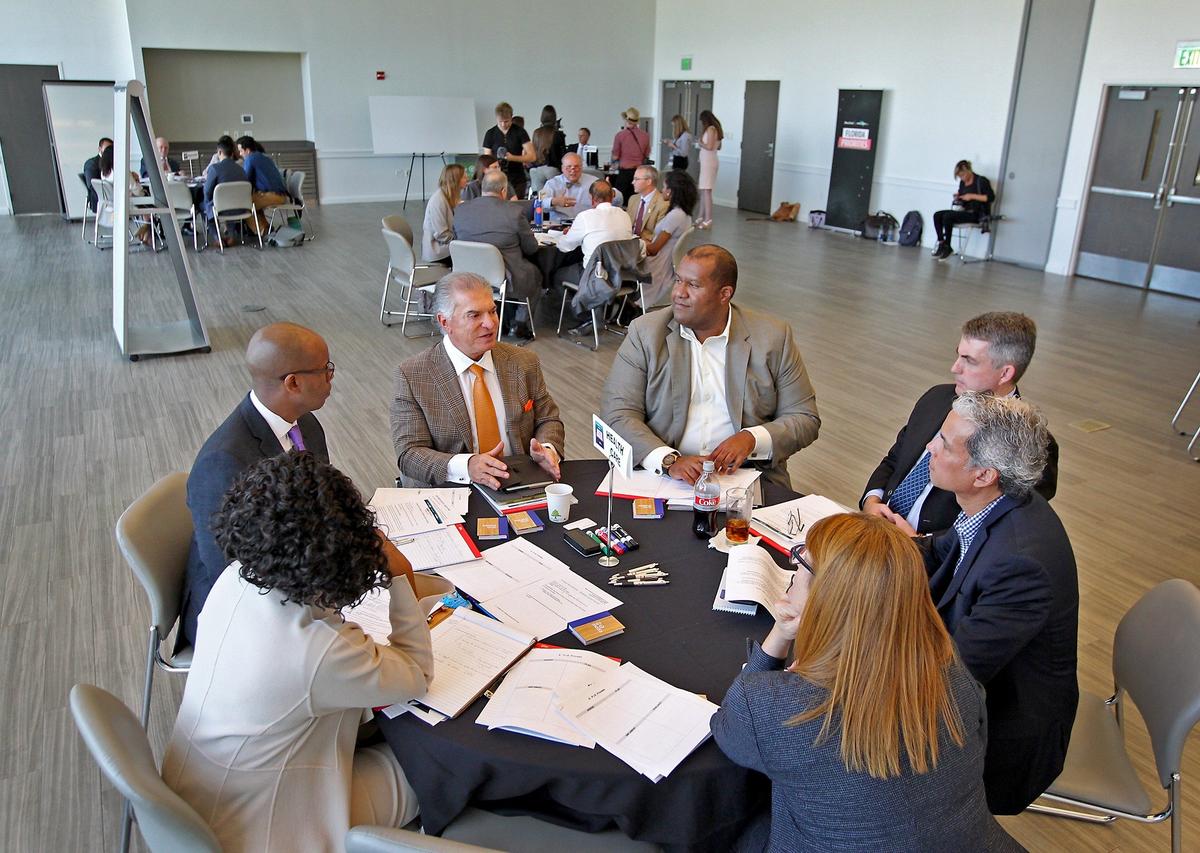Florida Influencers Al Cardenas (center) joins other Inflencers to  discuss healthcare in a breakout session  on Tuesday, November 13, 2018 during the Florida Priorities Summit at the University of Miami.  The Florida Influencer Series, is the beginning of a conversation among leaders, decision makers, and voters to put a sharp focus on a shared vision for Florida.