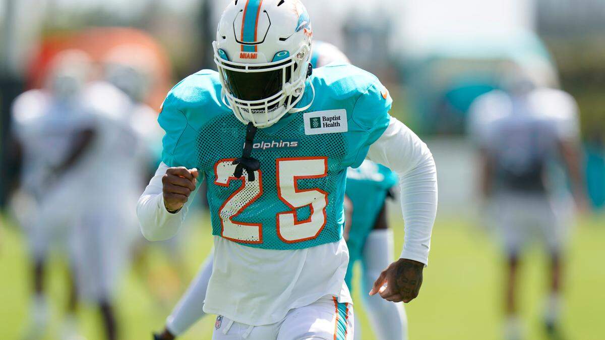 Miami Dolphins cornerback Xavien Howard warms up during drills at the NFL football team’s practice facility, Saturday, Aug. 6, 2022, in Miami Gardens, Fla. (AP Photo/Wilfredo Lee)