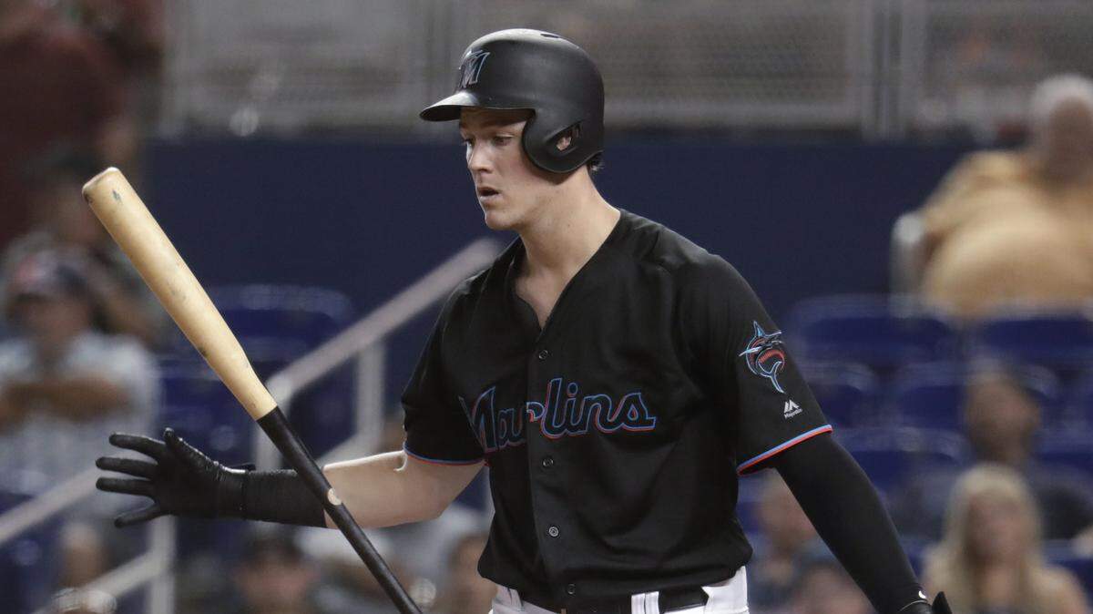 Miami Marlins’ Brian Anderson tosses his bat after striking out during the fifth inning of the team’s baseball game against the Atlanta Braves, Friday, May 3, 2019, in Miami.