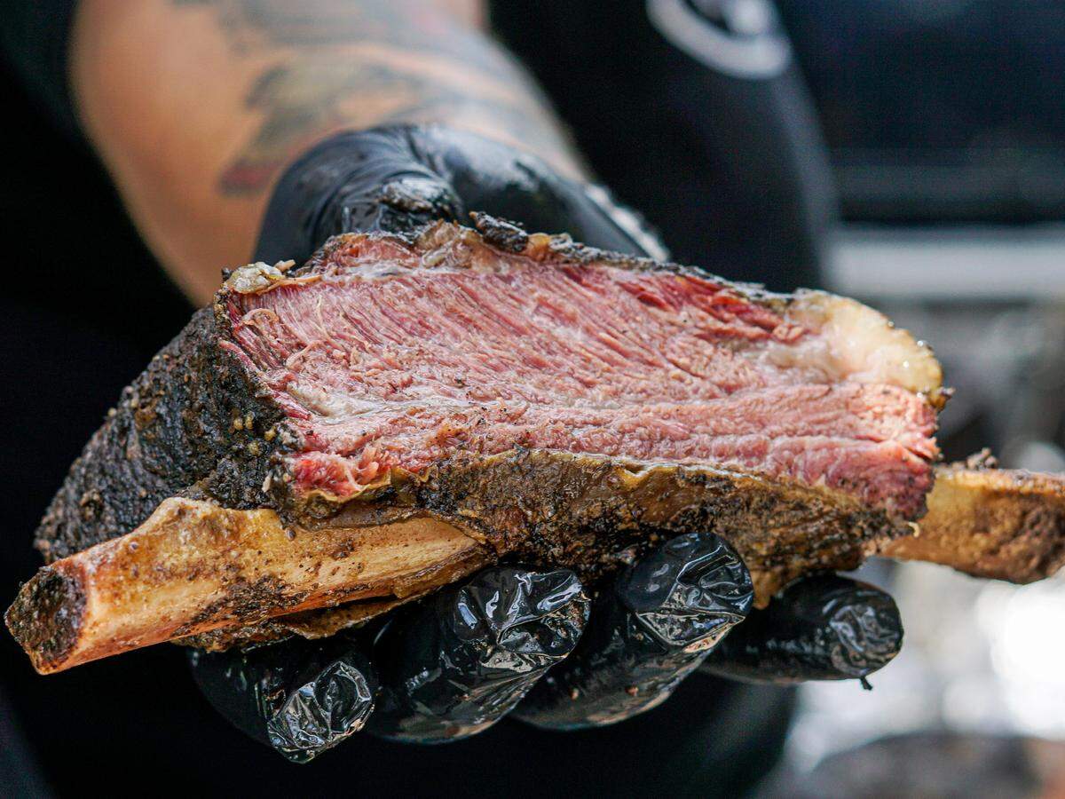 The beef rib at Apocalypse Barbecue uses a coffee rub and comes with a colada barbecue sauce.