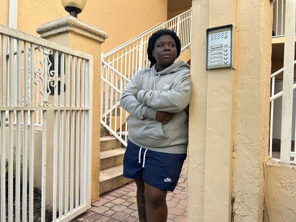Bryanna Carter, shown here outside her Pembroke Pines apartment, has been looking after her two younger brothers for nearly two years after taking custody of them in 2023.