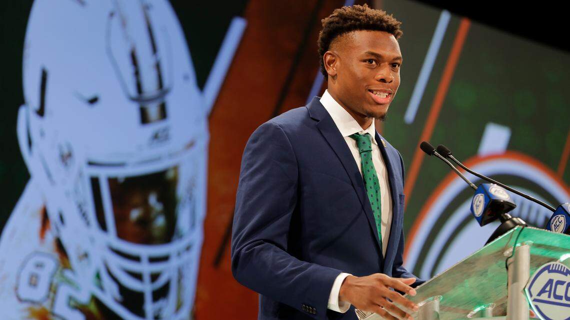 Miami’s Ahmmon Richards answers a question during a news conference at the NCAA Atlantic Coast Conference college football media day in Charlotte, N.C., on Wednesday, July 18, 2018. (AP Photo/Chuck Burton)