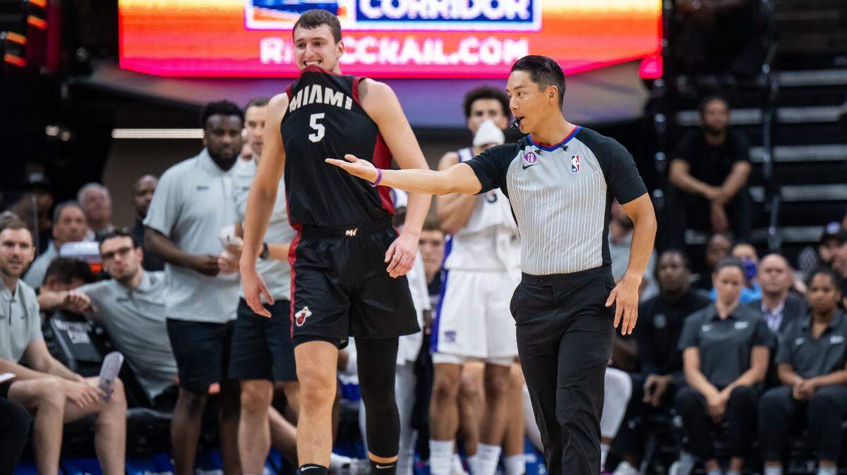 Miami Heat forward Nikola Jovic (5), left, reacts to a loose ball foul called on his team in the first half of their California Classic NBA summer league basketball game Wednesday, July 5, 2023, at Golden 1 Center.