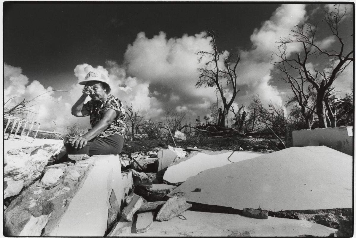Maybelle Symonette, a 72-year-old widow, mourns the loss of three of her homes in the Bahamas in August 1992. Two were rental properties and the third was her primary residence. The Sand Castle Cottages were all destroyed by Hurricane Andrew.