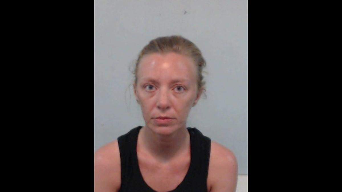 Kimberly Bingham Dunn was booked into Columbia County Jail in north Florida on a contempt of court charge on June 14, 2018, for failing to show up to court on an aggravated battery charge, stemming from an October 2017 arrest for shooting her estranged husband when he tried to take the AC unit out of her home, according to Columbia County Sheriff's Office.