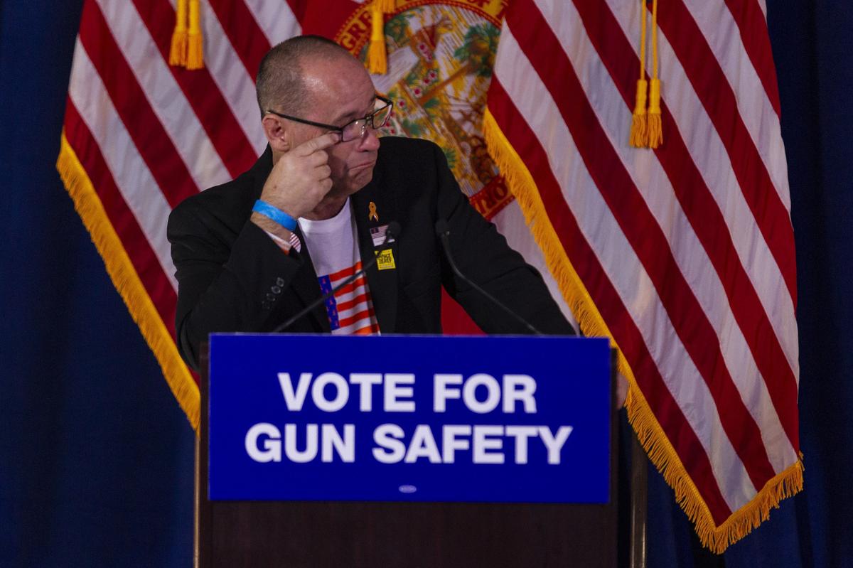 Fred Guttenberg, the father of Jaime Guttenberg who was killed during the Parkland shooting last February, wipes a tear during a gun safety rally at the Coral Springs Museum of Art on Friday, October 5, 2018.