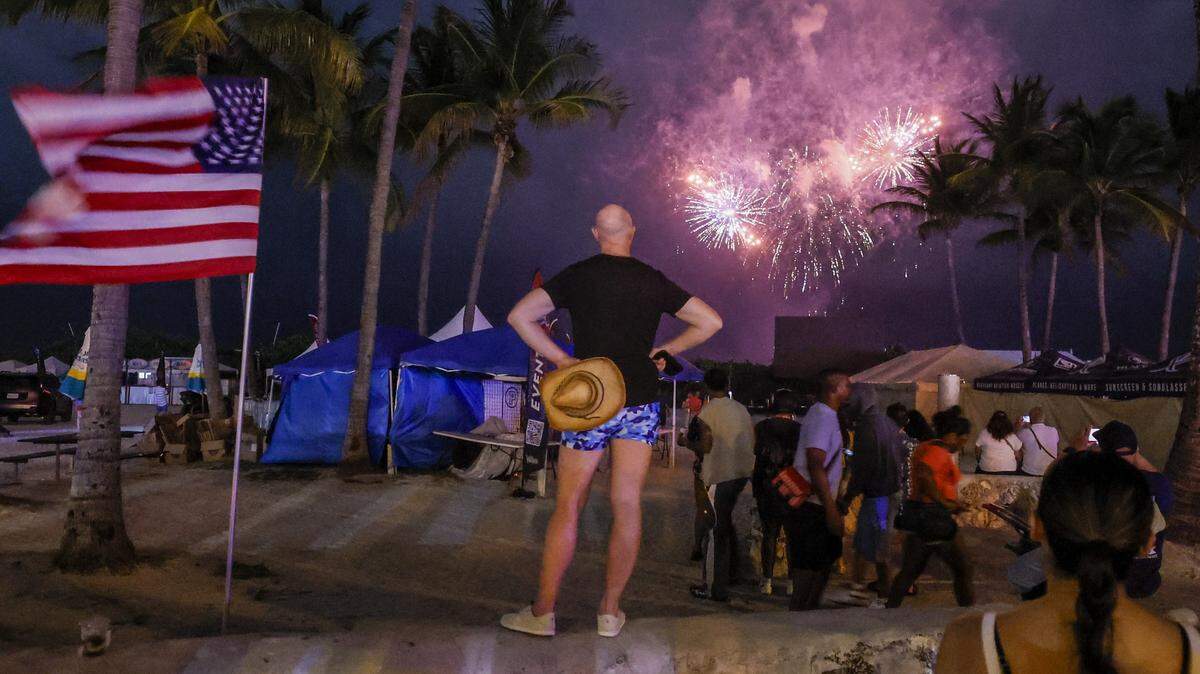 Attendees watch a fireworks display during Memorial Day Weekend events at the Hyundai Air & Sea Show in Miami Beach, Florida, on Saturday, May 23, 2026.