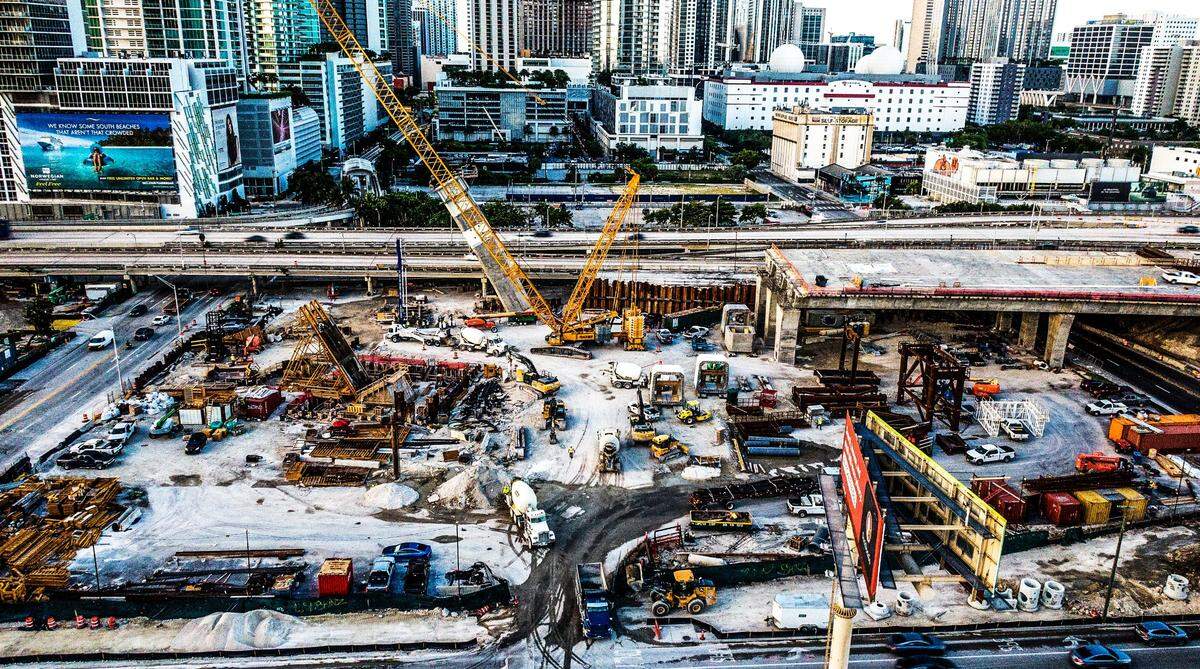 File photo of southeast view of construction of two arches and the center pier footer for the I-395 signature bridge as part of the I-395/SR 836/I-95 Design-Build Project, on Aug. 3, 2022.
