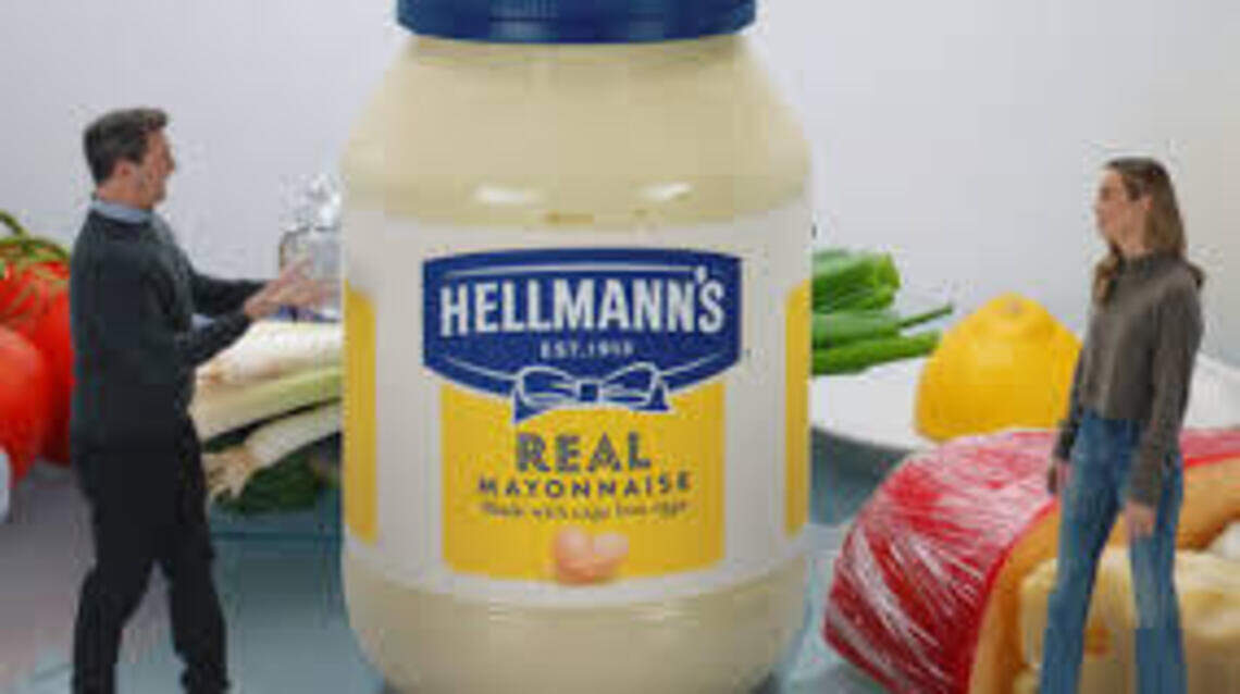 Super Bowl With a Smirk: Hamm & Brie at $233,000 a second, chicken wings, Mannings & a zodiac winner