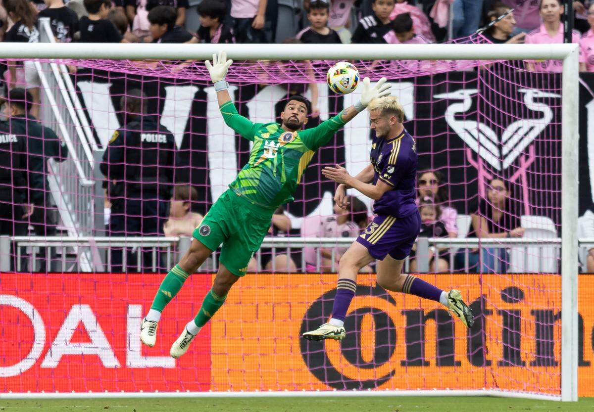 Inter Miami goalkeeper Drake Callender (1) blocks a shot by Orlando City forward Duncan McGuire (13) in the first half of their MLS match at Chase Stadium on Saturday, March 2, 2024, in Fort Lauderdale, Fla.