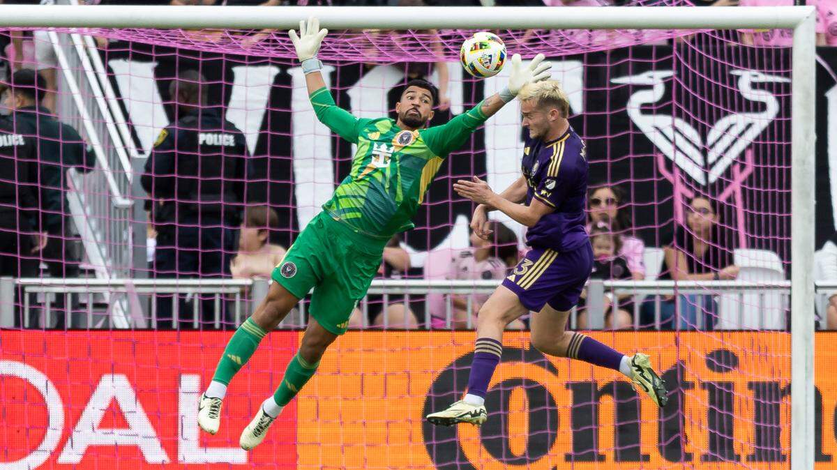 Inter Miami goalkeeper Drake Callender (1) blocks a shot by Orlando City forward Duncan McGuire (13) in the first half of their MLS match at Chase Stadium on Saturday, March 2, 2024, in Fort Lauderdale, Fla.
