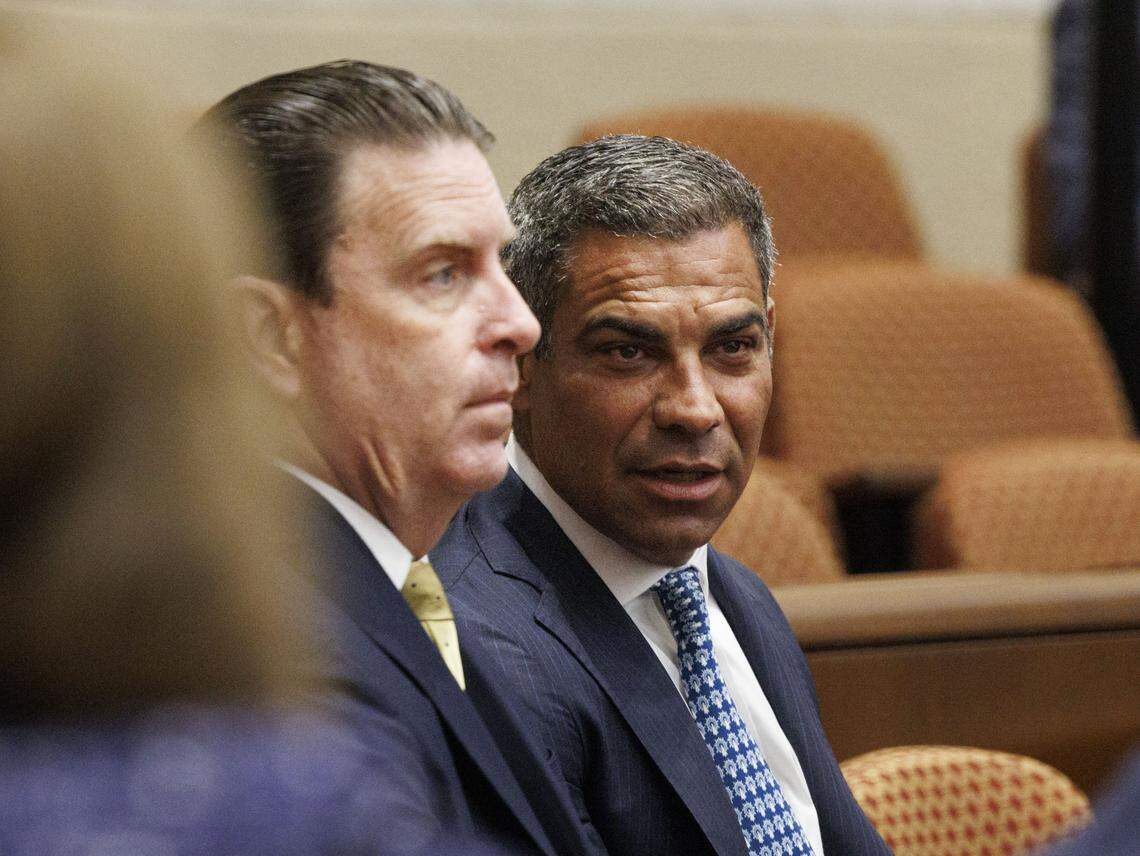 Mayor Francis Suarez, right, talks to City Attorney George Wysong in the first row during a hearing at the Third District Court of Appeal for a case Emilio González brought against the City of Miami on Tuesday, July 29, 2025, in Miami.