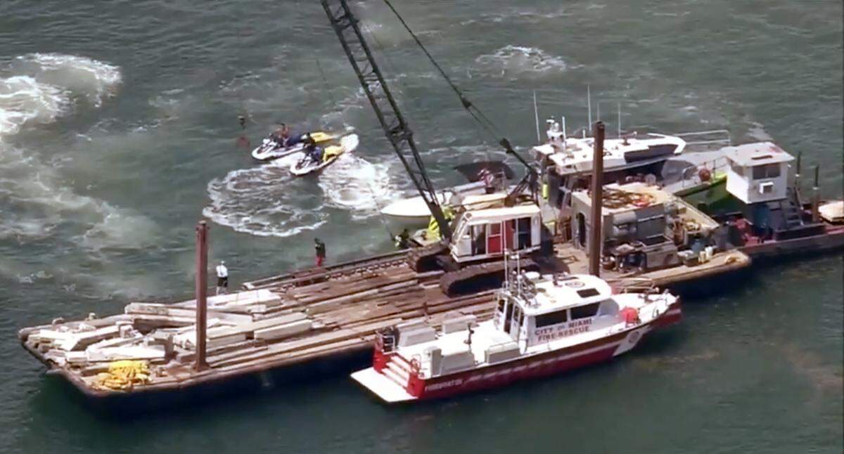 A sailboat sank off Miami Beach’s Hibiscus Island in Biscayne Bay Monday morning, July 28, 2025, after a barge hit it, authorities said. Five children and a camp counselor were aboard the sailboat, part of a Miami Yacht Club summer camp. Two children died and two are in critical condition in Jackson Memorial Hospital, the Coast Guard said.