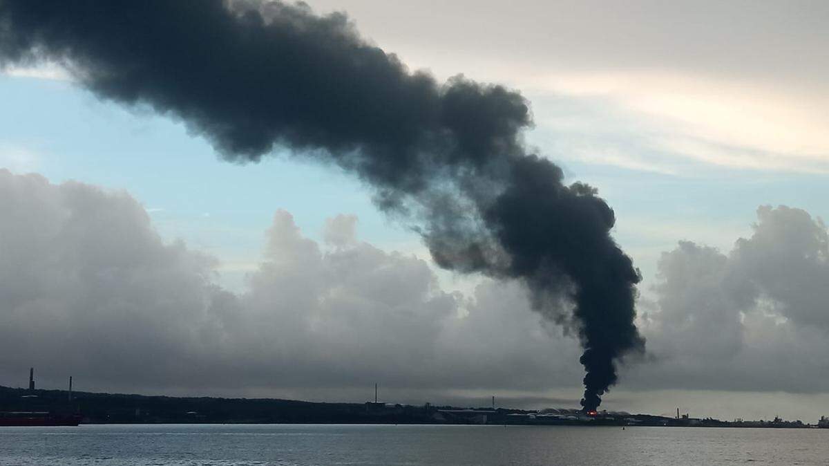 A lightning strike sparked a fire in a crude oil tank at a fuel supertanker base in Cuba, government says. No injuries or deaths have been reported yet.