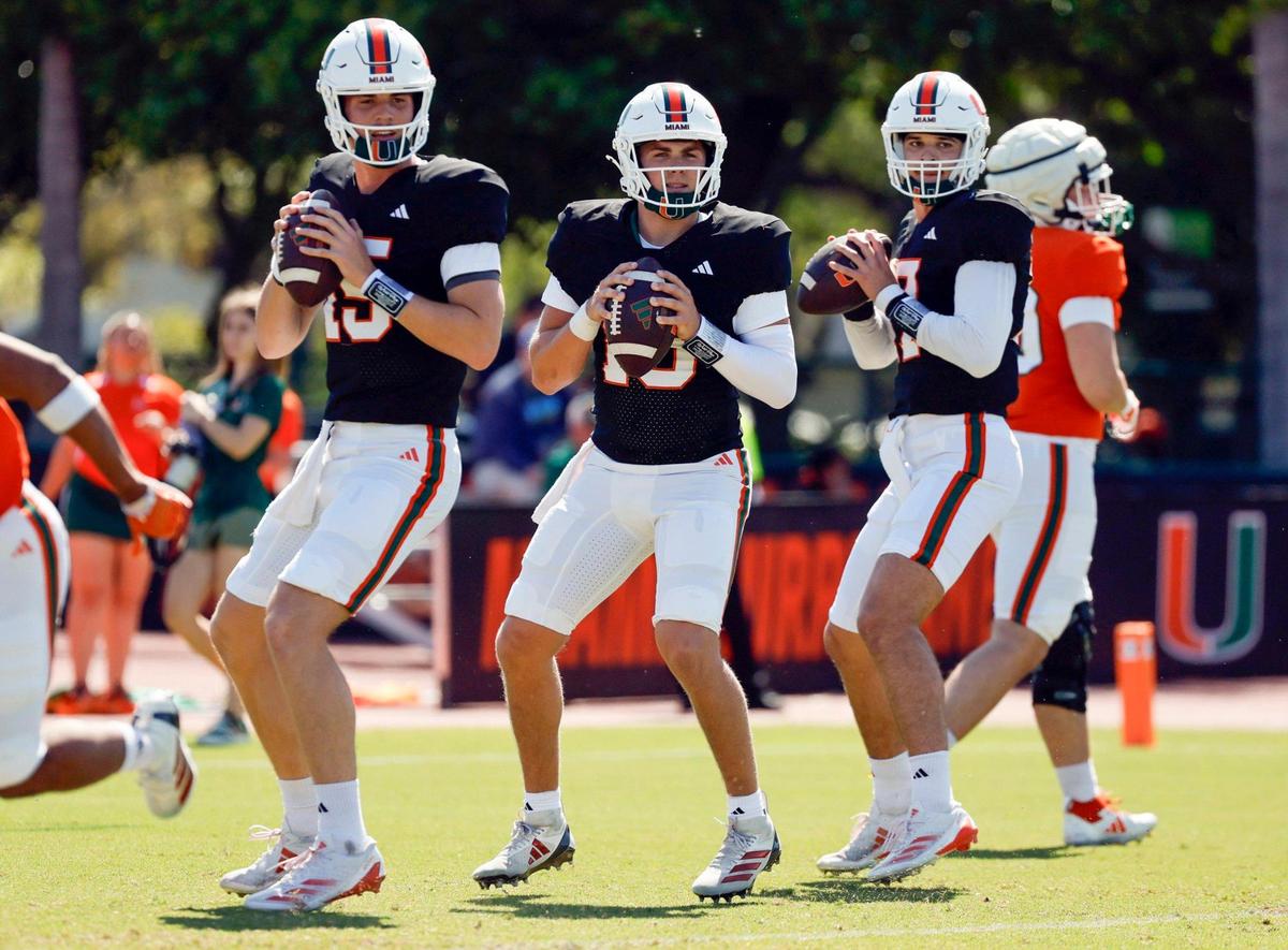 UM quarterback Judd Anderson (15), Luke Nickel (16) and Emory Williams (17) set up to pass during warmups before the start of the Miami Hurricanes football spring game on at Cobb Stadium on UM’s campus in Coral Gables, Florida on Saturday, April 12, 2025.