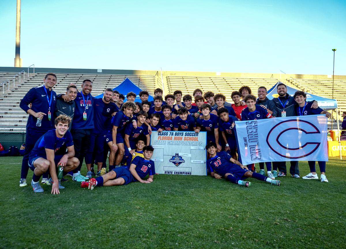 Columbus’ boys’ soccer team celebrates after beating Windermere on Tuesday in a Class 7A state semifinal at SpecMartin Stadium in DeLand, Fla.
