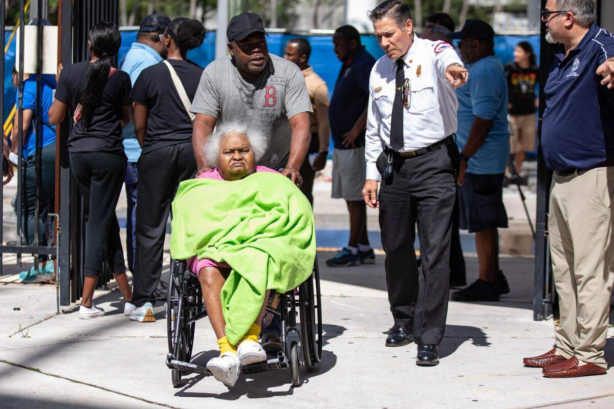 Victims of the Temple Court Apartment fire arrive at the Jose Marti Gym on 434 SW and 3rd Ave. to receive aid on Monday, June 10, 2024 in Miami, Fla.