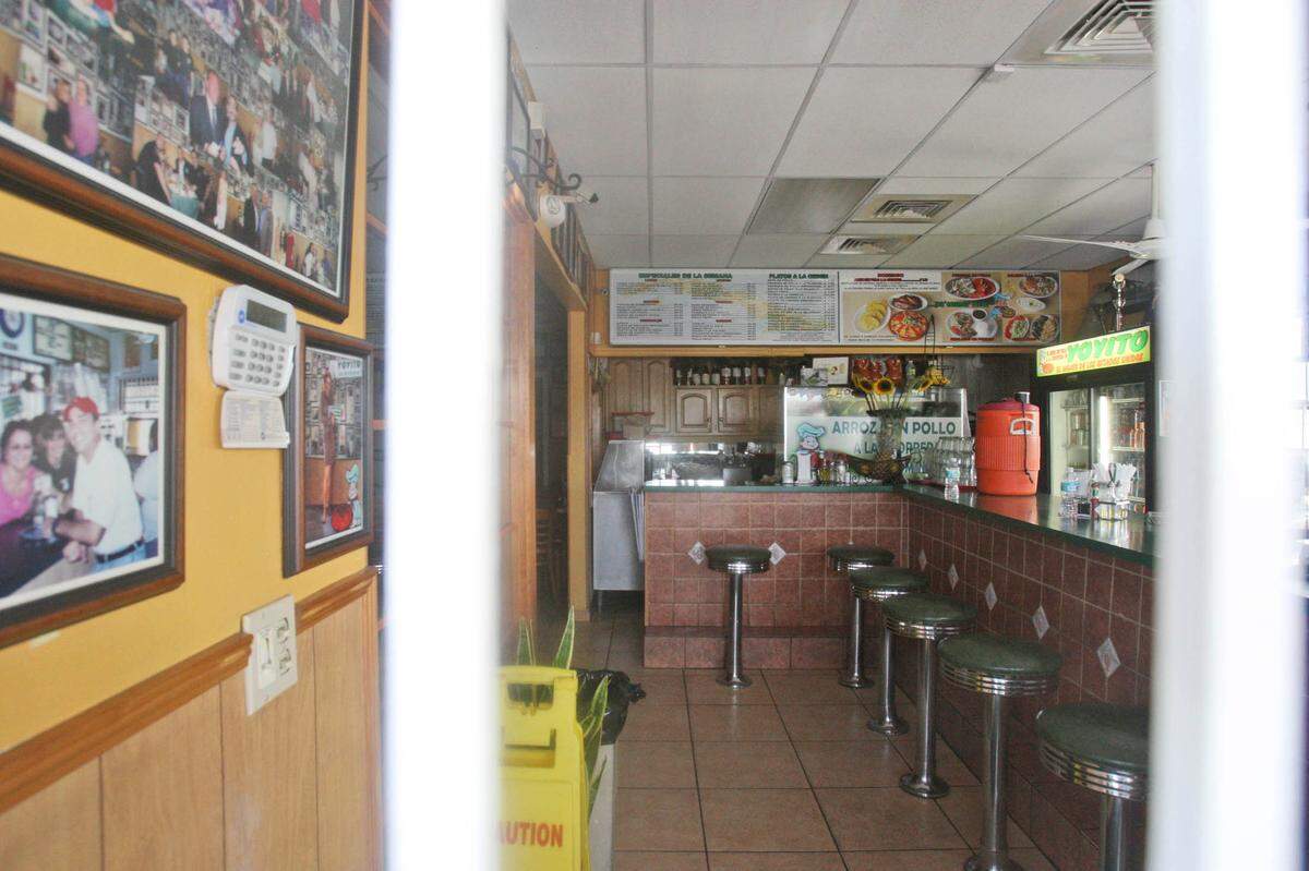 A view of the interior of Yoyito Cafe-Restaurant is shown in Hialeah, Fla., Monday, June 7, 2010. Police say a gunman shot and killed four people at the restaurant Sunday night and wounded three others before killing himself.