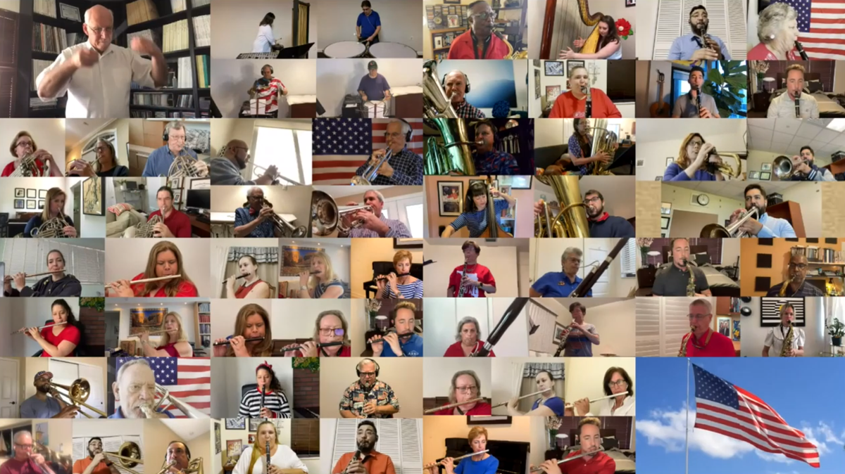 Conductor Robert Longfield leads some of the Greater Miami Symphonic Band musicians in a still from a video of “America The Beautiful” performed virtually by the community group.