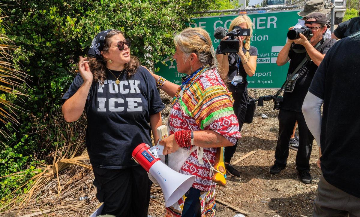 Organizer Betty Osceola talks to a protester as she asks not to block the entrance to the Dade-Collier Training and Transition Airport during the “Stop Alligator Alcatraz” protest in opposition to the construction of a massive detention facility for undocumented immigrants on the site, which is in the middle of the Florida Everglades, in Ochopee, Florida, on Saturday June 28, 2025.