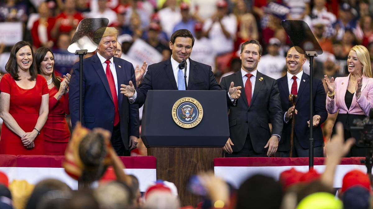 In happier times, Florida’s Gov. DeSantis speaks during then-President Trump’s “homecoming” rally in Sunrise, Florida in 2019.