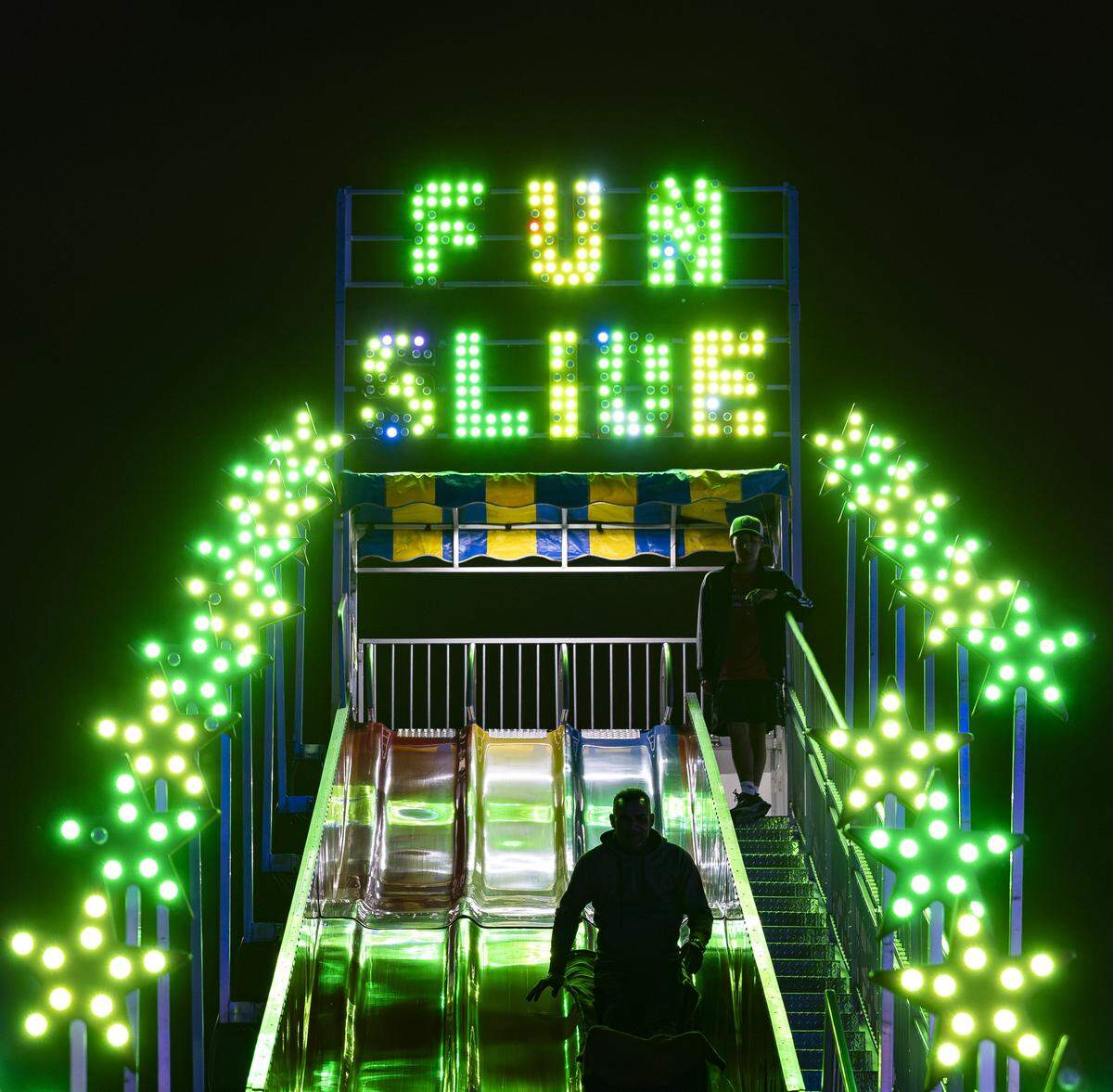 A fun slide attraction is operational during the grand opening of Ripley's Believe It or Not! Christmas Park at Amelia Earhart Park on Thursday, Nov. 13, 2025, in Hialeah, Fla.