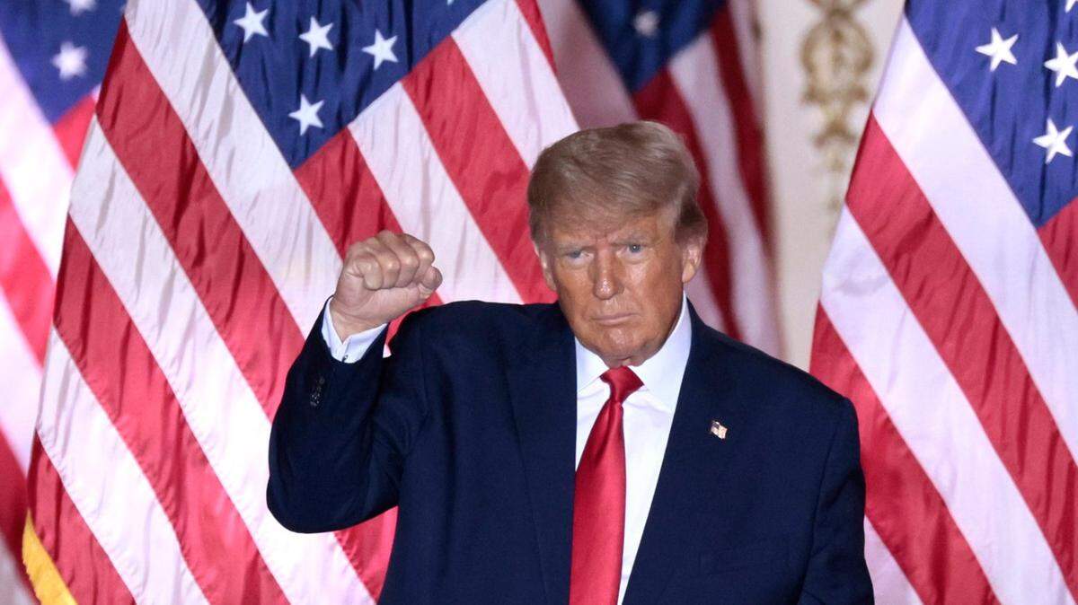 Former President Donald Trump takes a verbal jab at Florida Gov. Ron DeSantis over legislation that DeSantis supports but Trump calls a bailout for the insurance industry. In this photo, Trump pumps his fist as he reacts to the crowd after announcing his third bid for the presidency from his Mar-a-Lago club in Palm Beach, Florida, on Tuesday, Nov. 15, 2022.
