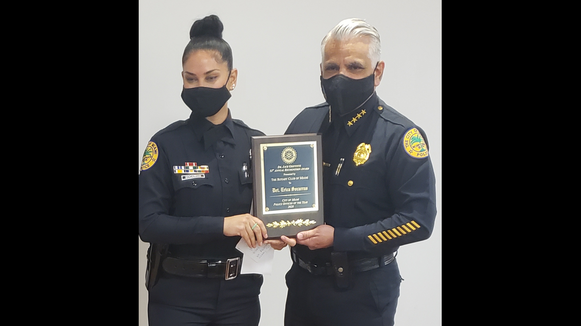 Miami Police Detective Erica Socarras with Miami Police Chief Jorge Colina. She was recognized as the Outstanding Officer of the Year of the Miami Police Department, receiving the Griffitts Award from the Rotary Club of Miami.